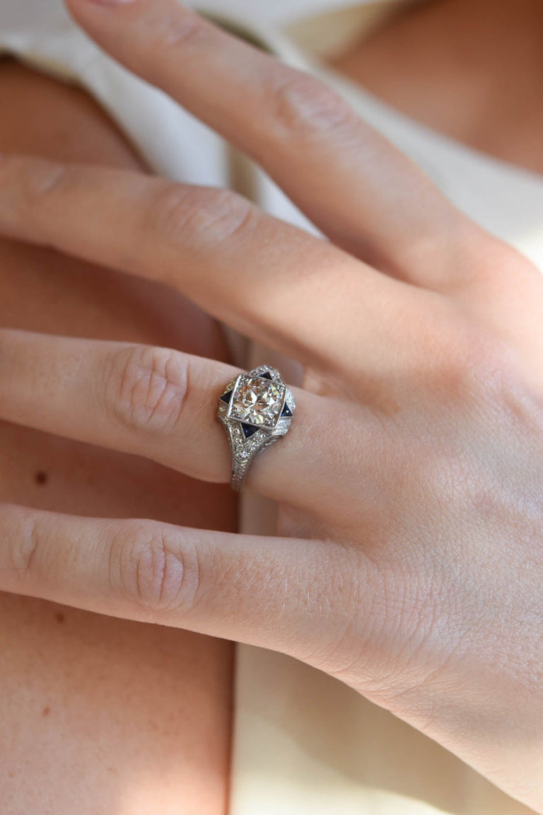 Art Deco 1.28 Carat Circular Brilliant Cut Diamond and Sapphire Platinum Vintage Engagement Ring