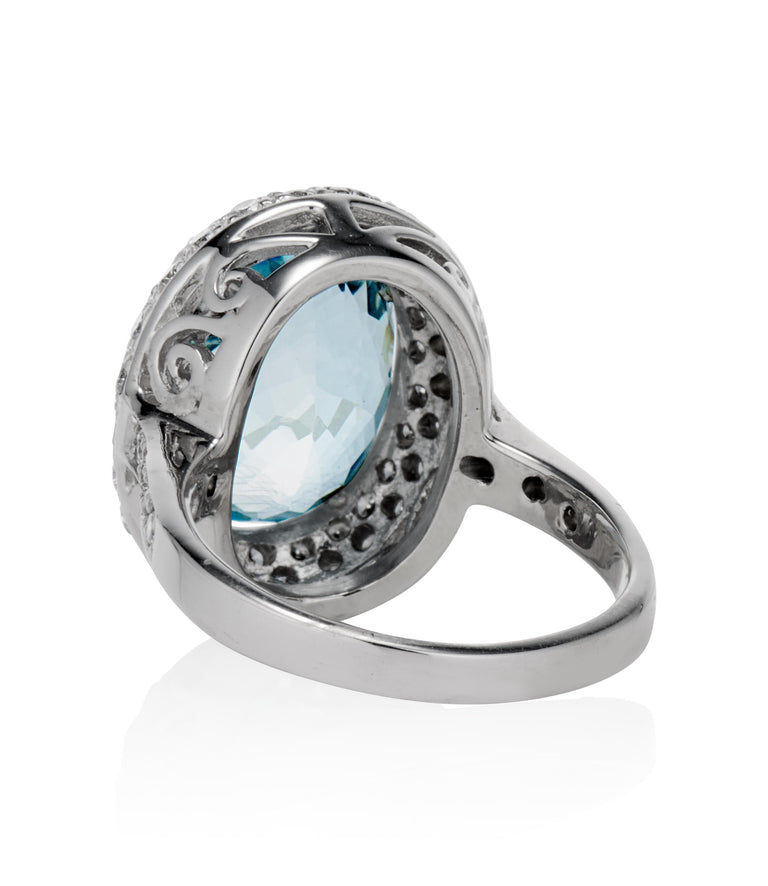 Contemporary 5.15 Carat Checkered Oval Aquamarine and Diamond Cluster White Gold Engagement Ring