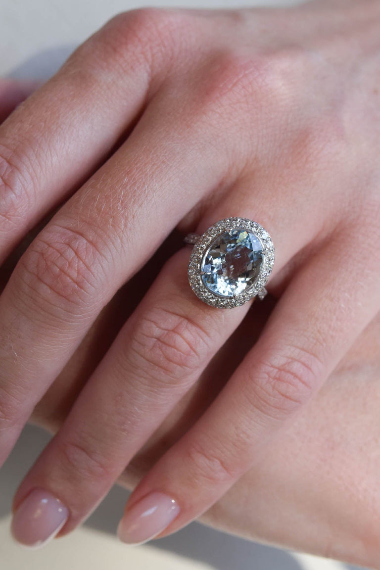 Contemporary 5.15 Carat Checkered Oval Aquamarine and Diamond Cluster White Gold Engagement Ring