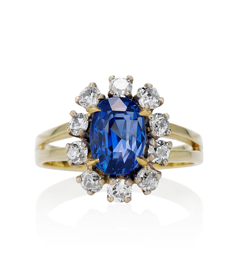 Midcentury 3.22 Carat Oval Step Cut Sri Lanka No Heat Sapphire and Diamond Two Tone Gold Cluster Engagement Ring