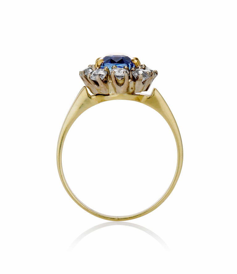 Midcentury 3.22 Carat Oval Step Cut Sri Lanka No Heat Sapphire and Diamond Two Tone Gold Cluster Engagement Ring