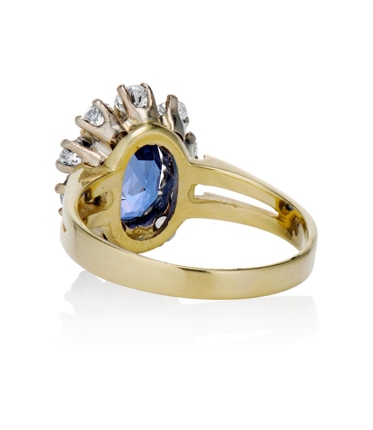 Midcentury 3.22 Carat Oval Step Cut Sri Lanka No Heat Sapphire and Diamond Two Tone Gold Cluster Engagement Ring