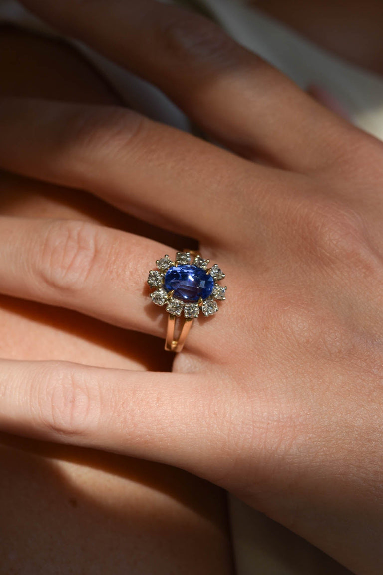 Midcentury 3.22 Carat Oval Step Cut Sri Lanka No Heat Sapphire and Diamond Two Tone Gold Cluster Engagement Ring