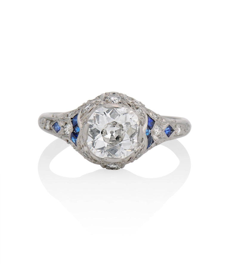 Art Deco 1.12 Carat Old Mine Cut Diamond and Calibrated French Cut Sapphire Platinum Ring