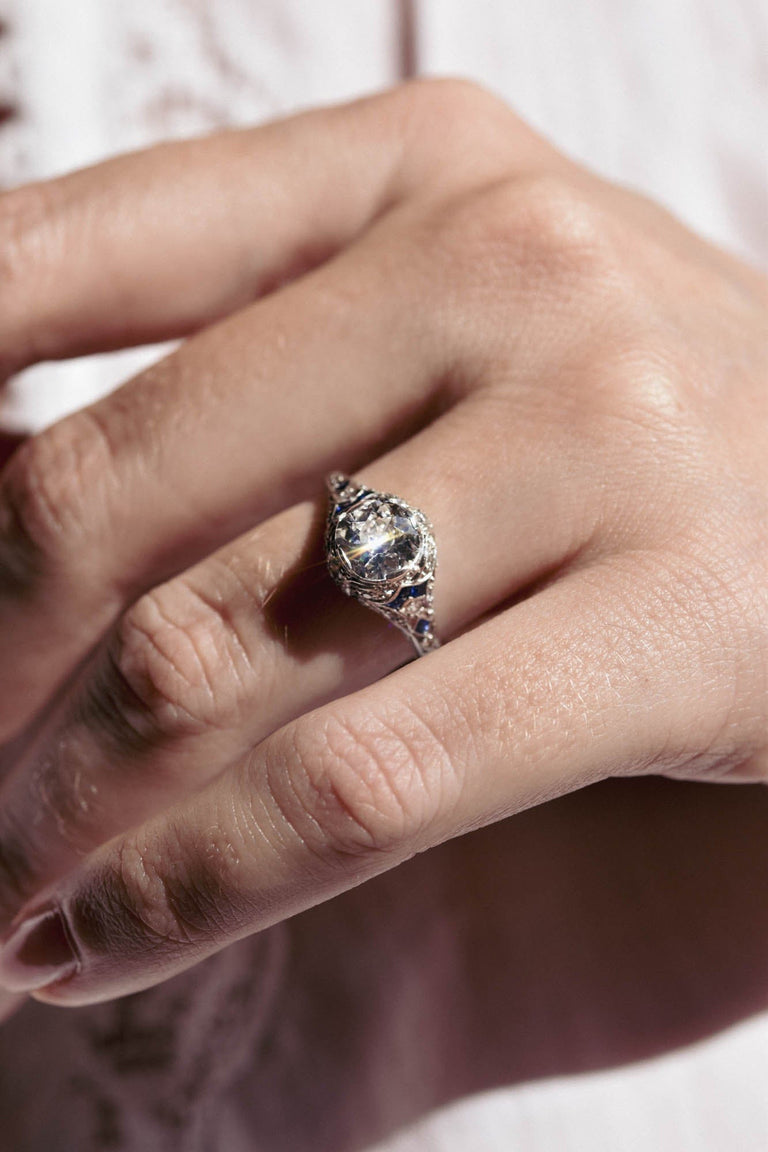 Art Deco 1.12 Carat Old Mine Cut Diamond and Calibrated French Cut Sapphire Platinum Ring