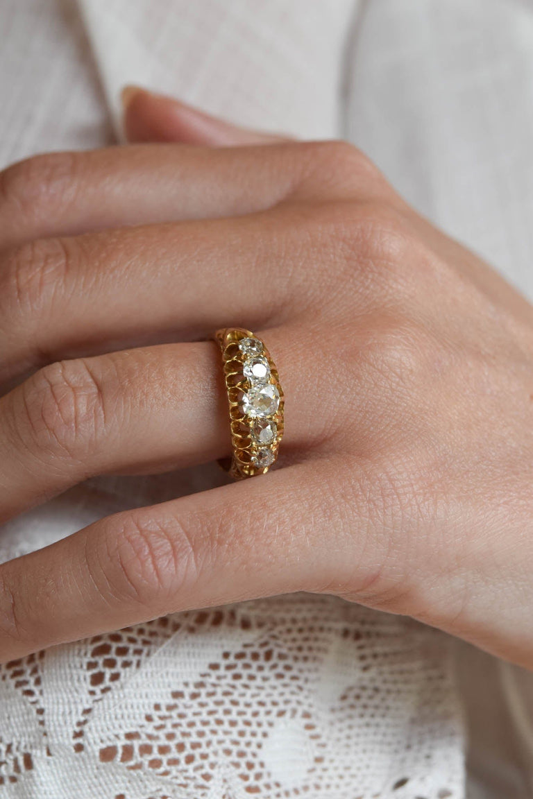 Belle Époque 1.40 Carat Old Mine Cut Diamond Yellow Gold Antique Five Stone Carved Band
